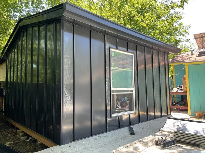 Black standing seam metal wall panels for Roof Inspection in Billerica