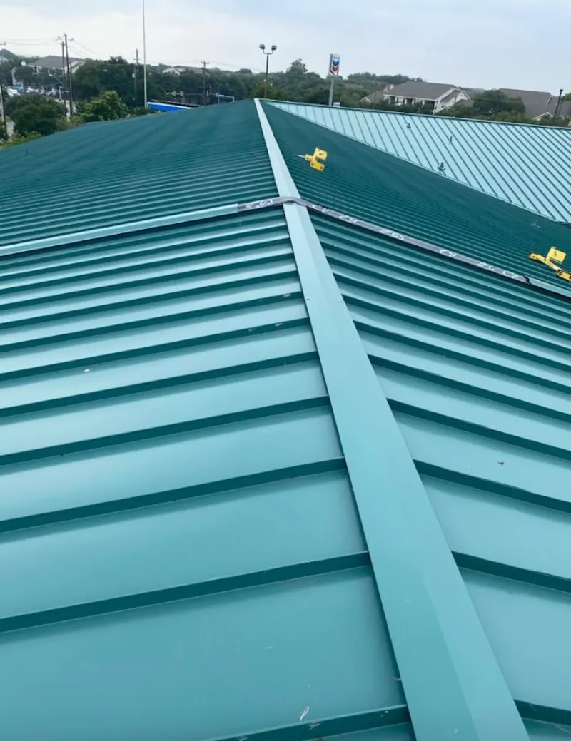 Green commercial metal roof ridge and valley for Metal Roof Repair in Billerica