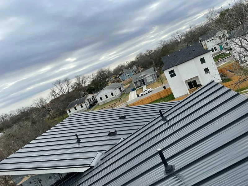 Standing seam metal roof panels with vents for Skylight Repair in Billerica